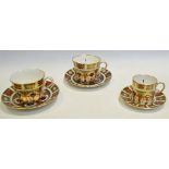 A Royal Crown Derby 1128 Imari tea cup and saucer, first quality; another similar,