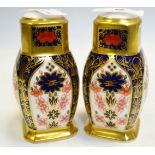 A pair of Royal Crown Derby 1128 pattern condiments, all gold borders, 10cm high,