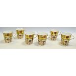 A set of six Royal Crown Derby 1128 pattern coffee mugs, all gold borders,