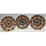 Three Royal Crown Derby 1128 pattern dinner plates, 27cm diam,