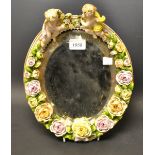 A 19th century oval mirror,