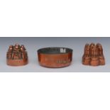 A Victorian copper jelly mould, Benham & Froud, with spiralled turrets, 13cm diam,