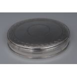 A George III silver oval tobacco box, stand-away hinged cover centred by a vacant cartouche,