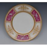 A Mintons pate-sur-pate circular plate, the borders with alternating panels,