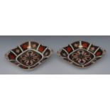A pair of Royal Crown Derby 1128 pattern shaped square dish, pierced acorn handles, conforming feet,