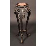 A Chinese padouk wood tall jardinere stand, circular inset marble top, gadrooned border,