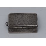 A 19th century Colonial silver rounded rectangular vinaigrette, probably Anglo-Indian,