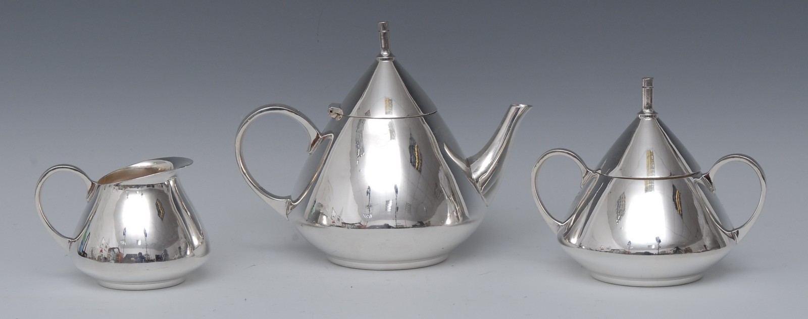A Dutch Art Deco electro-plated three piece conical bachelor's tea service, comprising teapot,
