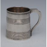 A George III silver child's mug, moulded rim above two broad reeded bands, angular scroll handle,