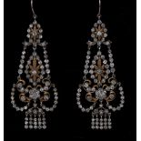 A pair of old cut diamond mounted chandelier earrings,