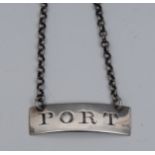 A George III silver curved rectangular wine label, Port, quite plain, engraved lettering, 4.