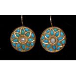 A pair of turquoise and seed pearl earrings, circular shield panel with a central pearl bead,