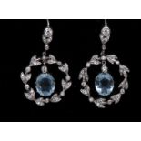 A pair of aquamarine and diamond chandelier earrings,