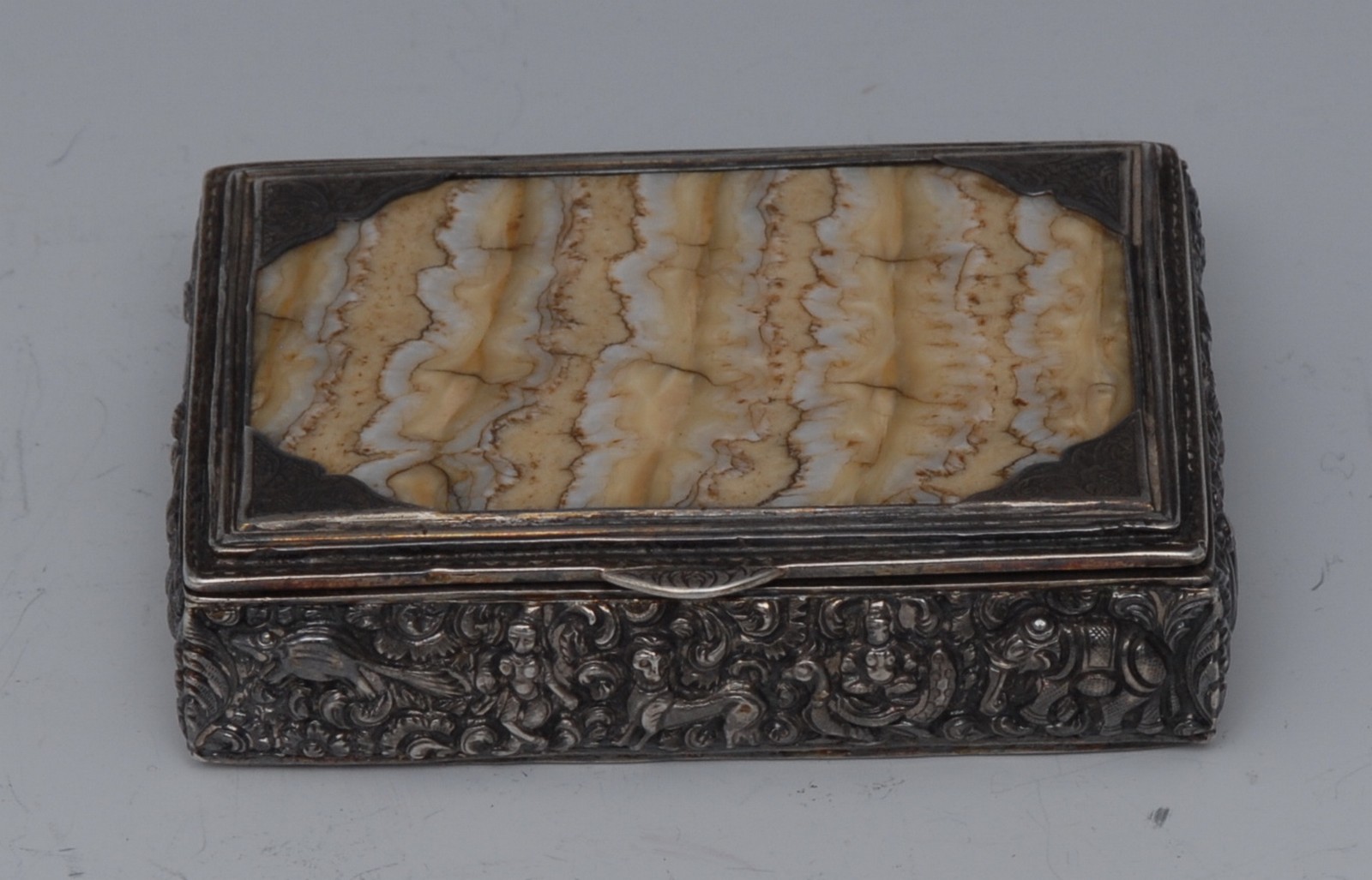 A 19th century Anglo-Indian silver coloured metal and fossilized mammoth tooth rectangular snuff