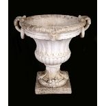 A substantial neo-classical fluted garden campana composition garden urn, divided scroll handles,