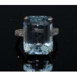 An aquamarine and diamond ring, rectangular table cut aquamarine, approx 15.