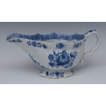 A Derby sauce boat, moulded in relief with cartouches and foliage,