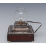 An unusual George V silver battery chamber lamp, glass shade, angular handle, spreading border,