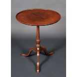 A George III mahogany occasional table, dished circular top, baluster turned column,