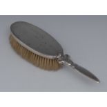 Georg Jensen - a silver hair brush, stylised lotus socle, 22.