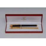 Must De Cartier - a Lady's gold plated fountain pen,ridged gold plated shaft,