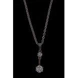 A diamond two stone pendant necklace, round brilliant cut principle droplet,
