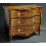 A good George III mahogany serpentine fronted chest, barberpole strings,