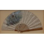 An early 20th century silk fan, blue tits on pine trees covered in snow, 63cm wide, c.