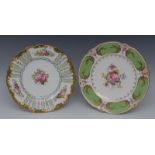 A Royal Crown Derby plate, the field painted with three roses,