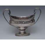 A George III silver two-handled boat shaped pedestal sauce tureen, reeded scroll handles,