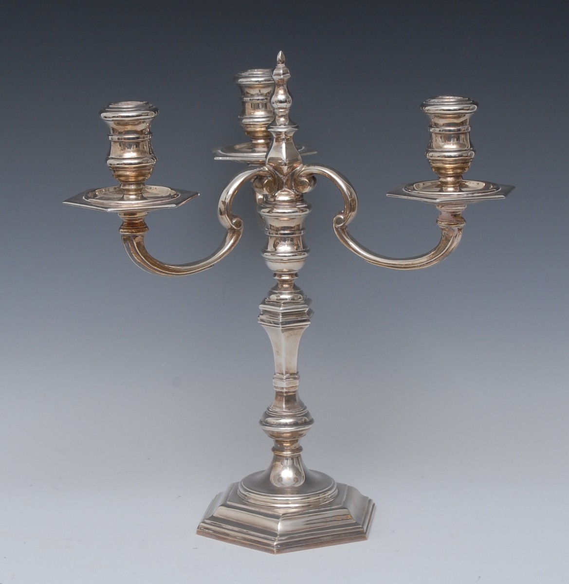 A George I style cast silver three-light table candelabrum, knop finial,