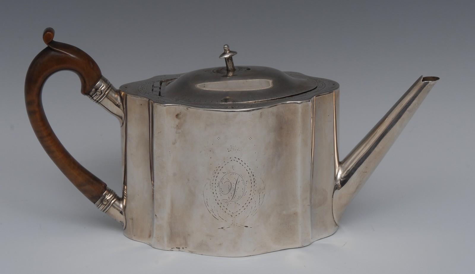 A George III silver commode shape teapot, hinged domed cover,