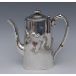 A Chinese export silver oval teapot, lobed finial, applied with a ferocious dragon, scroll handle,