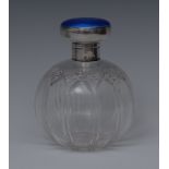 A large George V globular scent bottle, cut with stars and vertical lines, silver domed cover,