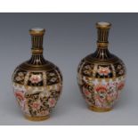 A pair of Royal Crown Derby 6299 pattern ovoid vases, long fluted necks, 14cm high, printed mark,