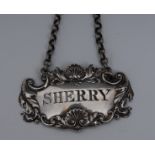 A George IV silver cartouche shaped cut-out wine label, Sherry, of good gauge,