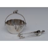 A Continental silver novelty sugar basket and tongs, each crested by a bear,