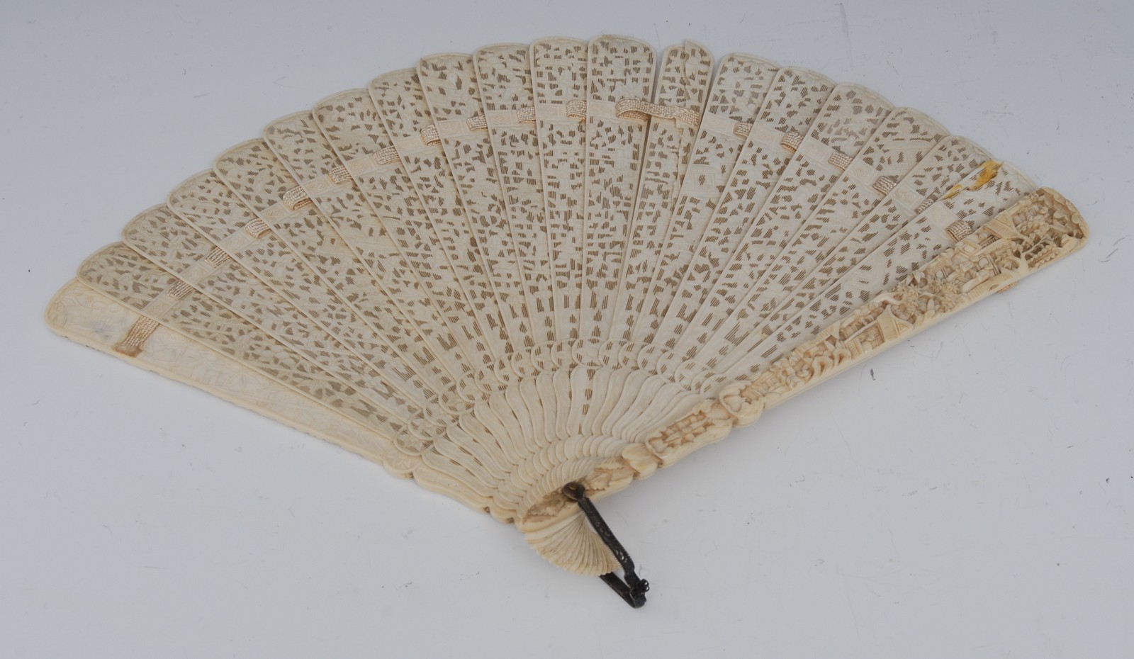 A 19th century Cantonese ivory twenty one stick brisee fan,