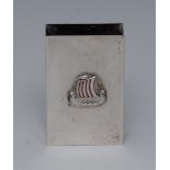 A Norwegian silver and enamel rectangular matchbook sleeve, applied with a longboat, 6cm long, .