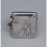 Golf - an American silver vesta case, embossed with a golfer taking a swing, hinged cover,