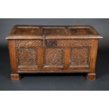 A Charles II oak three panel blanket chest, hinged top,