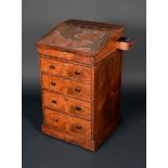 A George IV rosewood davenport, hinged sloping top enclosing small drawers, scribe's drawer to side,