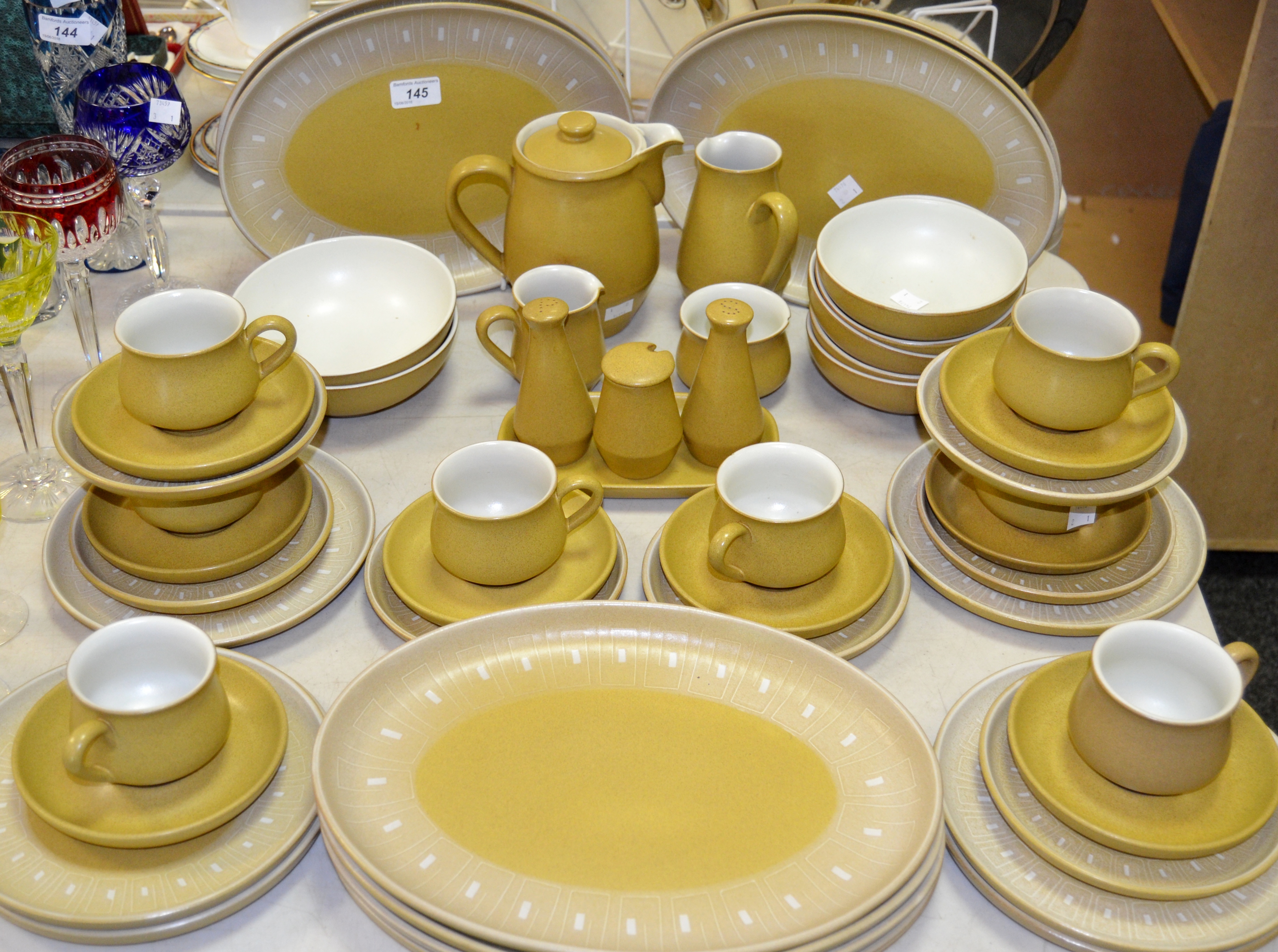 A Denby part dinner service, Ode pattern comprising of dinner plates, cereal bowls, salad plates,