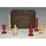 A 19th century turned ivory chess set, in the manner of Calvert, from 46, Cornhill, London,