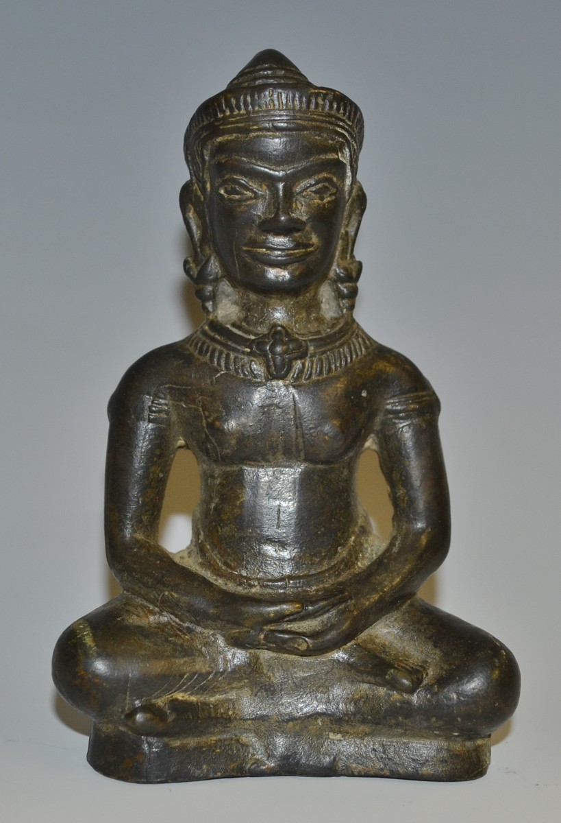 Asian School, a patinated bronze, of the Buddha, seated in mediation, 12cm high,