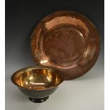 A 19th century Russian or Caucasian copper circular charger, of spun construction,