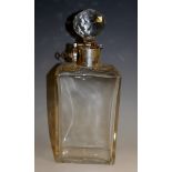 A George V silver mounted clear glass rectangular lockable decanter, prismatic stopper,
