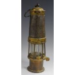 A 19th century North Midlands miners lamp, steel and brass, 30cm high, c.