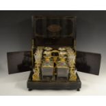 A 19th century French boulle and ebonised commode fronted decanter box,