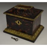 A 19th century European gilt metal mounted tortoiseshell casket, hinged sarcophagus cover,